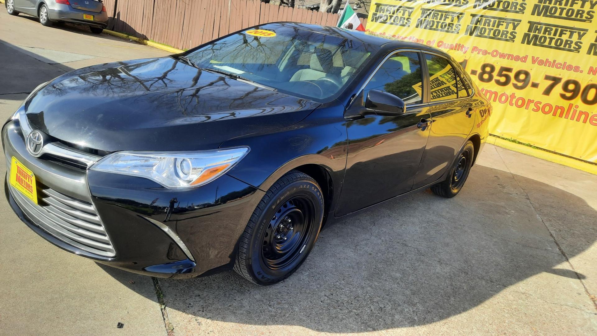 2015 Toyota Camry (4T4BF1FK0FR) , located at 16710 Clay Rd., Houston, TX, 77084, (281) 859-7900, 29.834864, -95.656166 - Photo#2